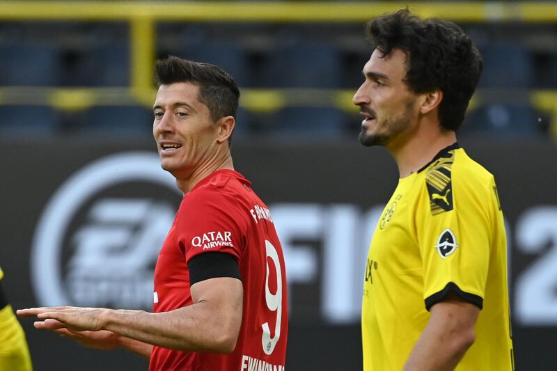 Bayern Munich's Polish forward Robert Lewandowski, left, and Dortmund's German defender Mats Hummels. AFP
