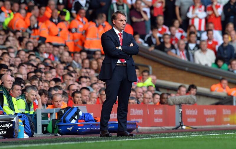 Brendan Rodgers and Liverpool are second in the Premier League, seven points off Chelsea with a game in hand. Paul Ellis / AFP