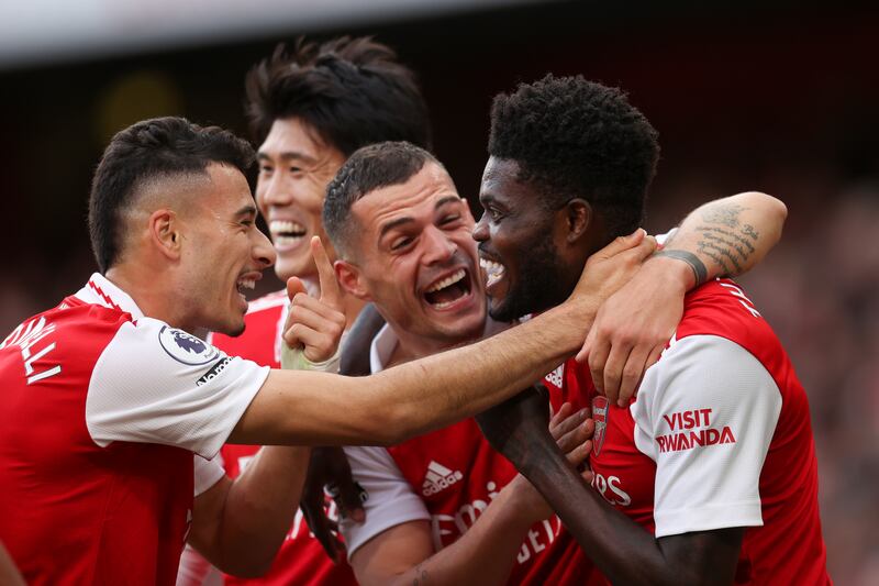 Thomas Partey celebrates with his Arsenal teammates after scoring the fourth goal in the 5-0 Premier League win against Nottingham Forest at Emirates Stadium on October 30, 2022. Getty