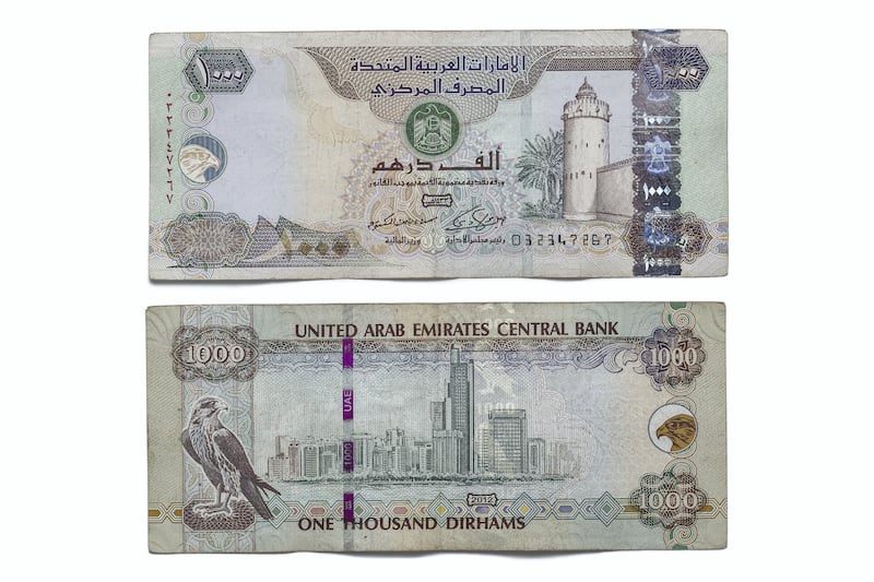 DUBAI, UNITED ARAB EMIRATES. 12 APRIL 2021. United Arab Emirates currency, UAE Money. One thousand dirham bank note, 1000 aed. (Photo: Antonie Robertson/The National) Journalist: Juman Jarallah. Section: National.