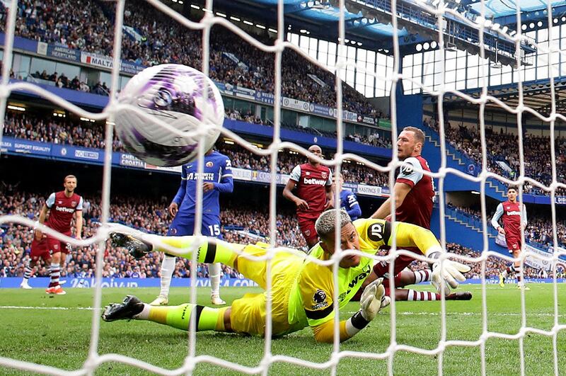 West Ham goalkeeper Alphonse Areola is beaten by Cole Palmer 's finish for the opening goal. Reuters