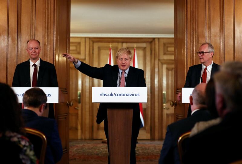 LONDON, ENGLAND - MARCH 12: British Prime Minister Boris Johnson, Chief Medical Officer for England, Chris Whitty and Government Chief Scientific Adviser, Sir Patrick Vallance hold a news conference addressing the government's response to the coronavirus outbreak on March 12, 2020 in London, England. (Photo by Simon Dawson-WPA Pool/Getty Images)