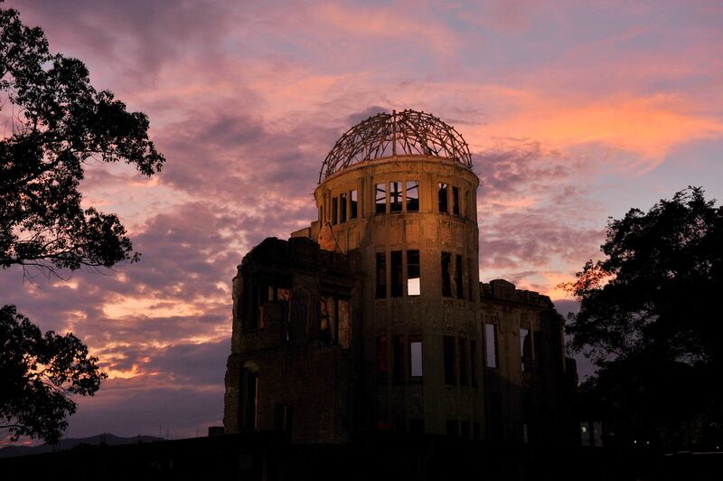 epa02855884 The Atomic Bomb Dome is seen at dusk at Peace Memorial Park in Hiroshima, western Japan, 05 August 2011, on the eve of the 66th anniversary of the atomic bombing by the USA in 1945. Hiroshima will mark the 66th anniversary of the bombing on 06 August for the first time after the Fukushima nuclear power plant accident disaster in March.  EPA/KIMIMASA MAYAMA *** Local Caption ***  02855884.jpg