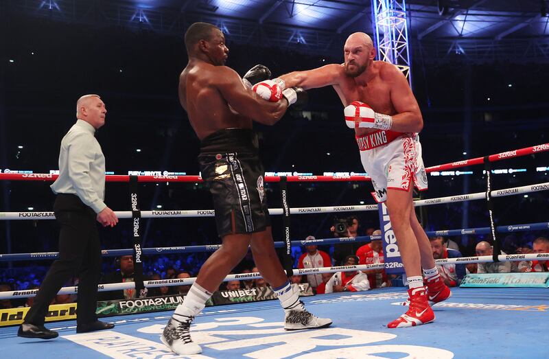 Tyson Fury lands a right cross on Dillian Whyte during their WBC world heavyweight title fight. Getty