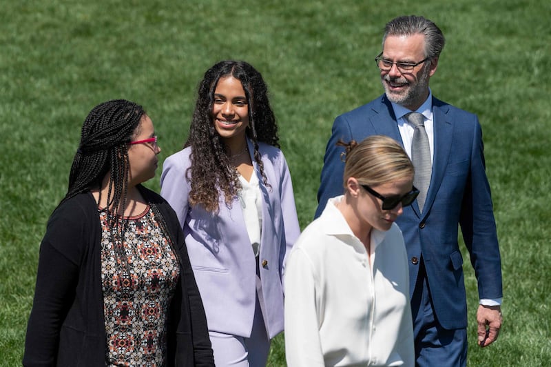 Ms Jackson's husband Patrick Jackson and their daughter Leila Jackson arrive at an event to celebrate Jackson's confirmation to the US Supreme Court. AFP
