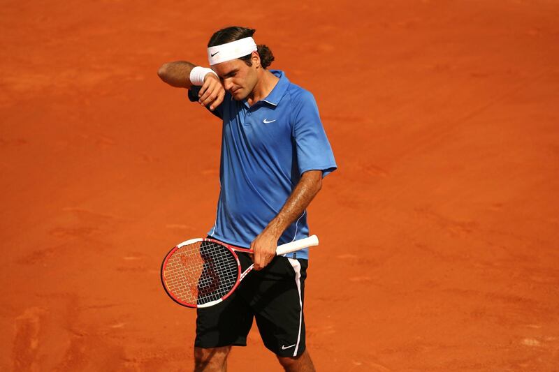 PARIS - JUNE 11:  Roger Federer of Switzerland looks dejected against Rafael Nadal of Spain during the Men?s Singles Final on day fifteen of the French Open at Roland Garros on June 11, 2006 in Paris, France.  (Photo by Clive Brunskill/Getty Images)