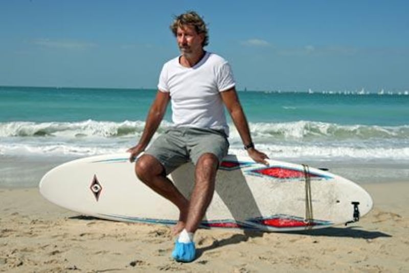 Surfer Michael Geraghty at Umm Suqeim Beach in Dubai, where he was bitten by what he claims was a shark last week.