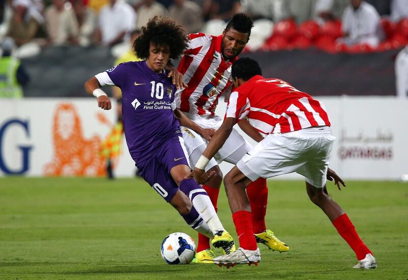 Omar Abdulrahman, the Al Ain playmaker, left, will likely enjoy some respite from the change in schedule. Marwan Naamani / AFP