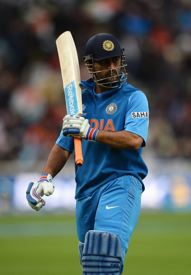 BIRMINGHAM, ENGLAND - JUNE 23: Mahendra Singh Dhoni of India looks dejected after being dismissed by Ravi Bopara of England during the ICC Champions Trophy Final between England and India at Edgbaston on June 23, 2013 in Birmingham, England.  (Photo by Gareth Copley/Getty Images) *** Local Caption ***  171208218.jpg