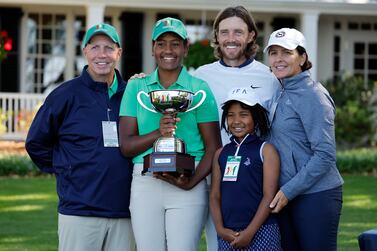 Maya Palanza Gaudin (2-L) poses with her Overall Champion Trophy with her adopted father, Stephen Gaudin (L), adopted mother, Cassandra (R), her sister Willa (2-R) and professional golfer Tommy Fleetwood (3-R) during the Augusta Drive, Chip and Putt National finals at the Augusta National Golf Club in Augusta, Georgia, USA, 02 April 2023.  The Augusta National Golf Club will hold the Masters Tournament from 06 April through 09 April 2023.   EPA/JOHN G.  MABANGLO