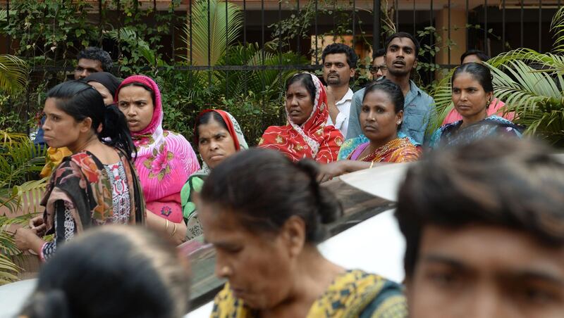 People gather outside the residence of Indian Bollywood actress Sridevi Kapoor in Mumbai  following her death in Dubai. Punit Paranjpe / AFP Photo