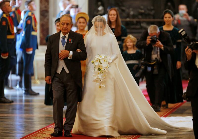 Victoria arrives accompanied by her father, Roberto Bettarini. She is the granddaughter of Grand Duke Kirill, a cousin of Nicholas II, the last Russian tsar who was executed along with his wife Alexandra and five children by the Bolsheviks in 1918