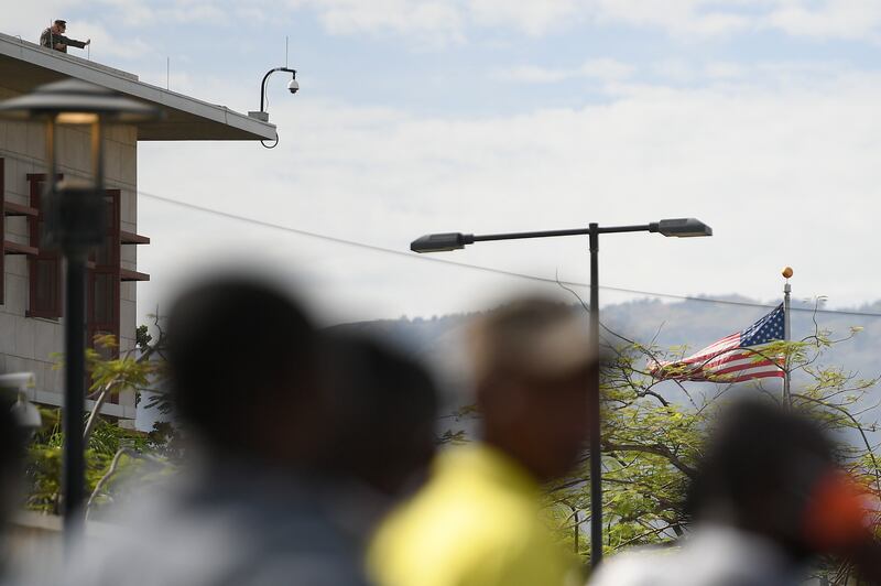 US soldiers atop of the US embassy in Port-au-Prince, Haiti on Monday. AP