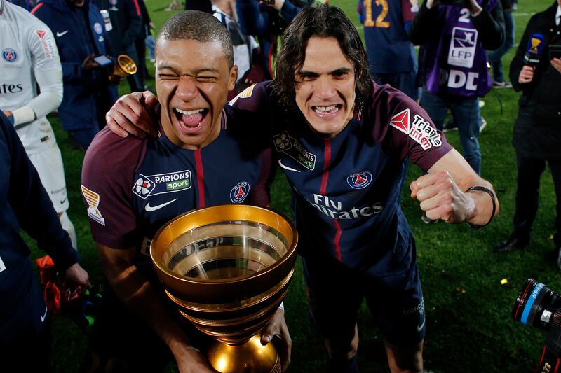 Kylian Mbappe and Edinson Cavani celebrate after beating Monaco in the 2018 French League Cup final. AP