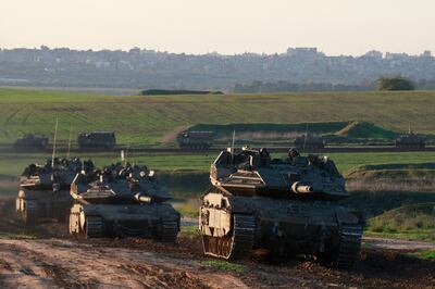 An Israeli armoured vehicle convoy returns from Gaza to Israel. AFP