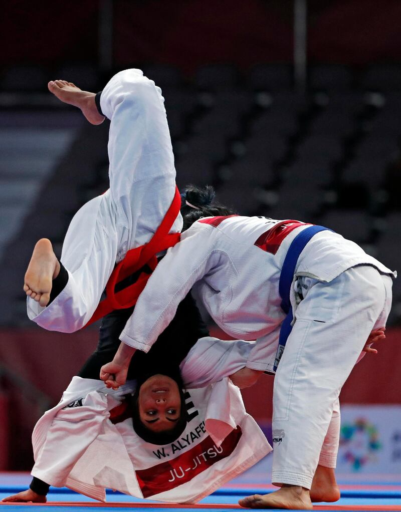 The UAE's Wadima Al Yafei and Thi Thanh Minh Duong of Vietnam in action during the women’s 49kg final. Issei Kato / Reuters