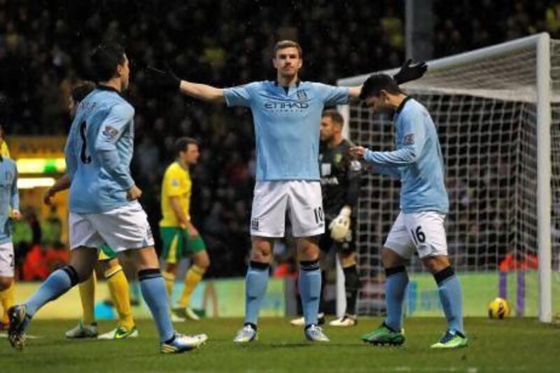 Edin Dzeko, often used as an impact player this season by Manchester City, scored twice after being asked to start against Norwich City this weekend. Ian Kington / AFP