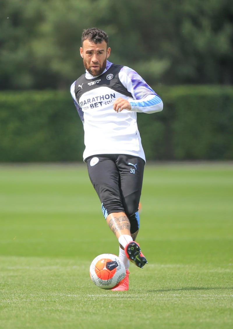 MANCHESTER, ENGLAND - JUNE 14: Manchester City's Nicholas Otamendi in action during training at Manchester City Football Academy on June 14, 2020 in Manchester, England. (Photo by Tom Flathers/Manchester City FC via Getty Images)