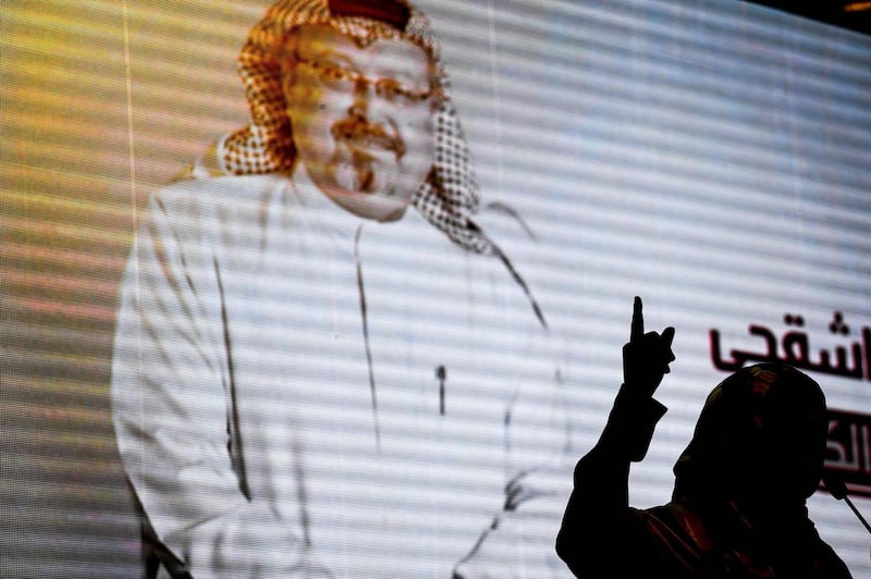 Nobel Peace Prize laureate Yemeni Tawakkol Karman stands in front of a digital image of Jamal Khashoggi as she speaks during a commemoration event of Khashoggi's supporters on November 11, 2018 in Istanbul.  US Secretary of State Mike Pompeo told Saudi Crown Prince Mohammed bin Salman on November 11, 2018 that the US will hold accountable all involved in killing a dissident Saudi journalist. / AFP / OZAN KOSE
