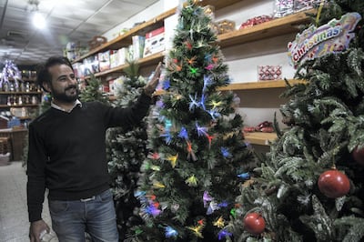 Achmed Ashgar says sales are very good for his shop that sells Christmas trees and decorations in Gaza City on December 20,2018. (Photo by Heidi Levine for The National).