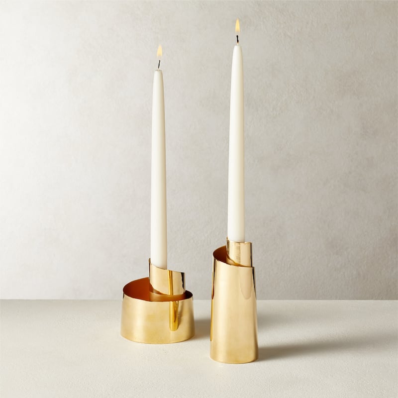 The Zuma brass taper candle holder from CB2's Decor Art capsule is inspired by the fluidity of 20th-century sculpture; Dh185. All photos: CB2