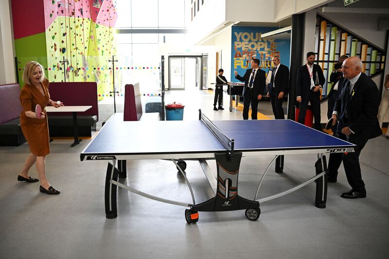 Liz Truss plays table tennis with former Conservative party leader Iain Duncan Smith during a visit to the Onside Future Youth Zone in London. Reuters