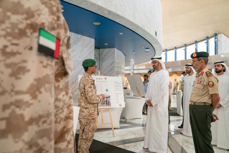 ABU DHABI, UNITED ARAB EMIRATES - April 28, 2019: HH Sheikh Mohamed bin Zayed Al Nahyan, Crown Prince of Abu Dhabi and Deputy Supreme Commander of the UAE Armed Forces (2nd R), attends e-skills exhibition for national service recruits, at Armed Forces Officers Club. Seen with HE Lt General Hamad Thani Al Romaithi, Chief of Staff UAE Armed Forces (R) and HE Mohamed Mubarak Al Mazrouei, Undersecretary of the Crown Prince Court of Abu Dhabi (back C).
( Mohamed Al Hammadi / Ministry of Presidential Affairs )
---