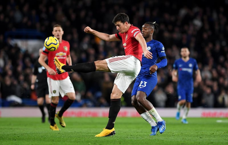 LONDON, ENGLAND - FEBRUARY 17: Harry Maguire of Manchester United clears under pressure from the Michy Batshuayi of Chelsea during the Premier League match between Chelsea FC and Manchester United at Stamford Bridge on February 17, 2020 in London, United Kingdom. (Photo by Shaun Botterill/Getty Images)
