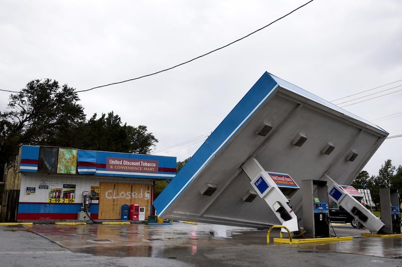 A gas station stands damaged during Tropical Storm Florence near Topsail, North Carolina. Bloomberg