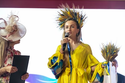 Anna Bondar won Best Traditional Dress, showcasing Ukrainian colours. Antonie Robertson / The National