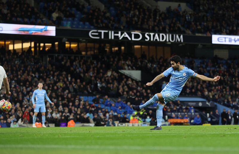 Manchester City's Ilkay Gundogan scores their first goal. Reuters