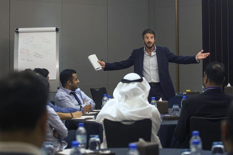 Tom Flatau, managing director of Team Working International, during a workshop with the British Business Group. Mona Al Marzooqi / The National 