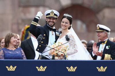 STOCKHOLM, SWEDEN - JUNE 13:  Prince Carl Philip of Sweden and HRH Princess Sofia, Duchess of Varmlands salute the crowd after their marriage ceremony on June 13, 2015 in Stockholm, Sweden.  (Photo by Andreas Rentz/Getty Images)