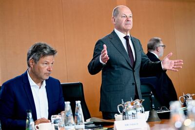 Chancellor Olaf Scholz, right, and Economy Minister Robert Habeck have been under pressure over the government's green agenda. EPA 