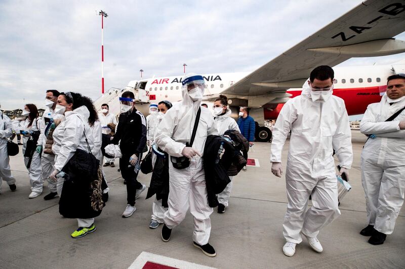 epa08329232 Albanian doctors arrive in Italy to help during the Covid-19 Coronavirus emergency at Leonardo Da Vinci airport in Fiumicino, Rome, Italy, 28 March 2020.  EPA/ANGELO CARCONI
