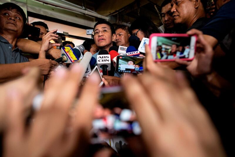 Philippine journalist Maria Ressa gives a statement after posting bail at a regional trial court in Manila. AFP