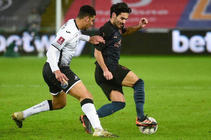 Ben Cabango – 6. Cautioned for a foul on Gundogan, which summed up the difficult evening the hosts had against the form side in the country. AFP