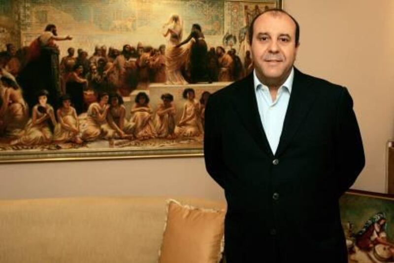 Belhassen Trabelsi, CEO of Carthago airlines and brother of fallen veteran leader Zine El Abidine Ben Ali's wife poses in his office in Tunis in September 2010. Belhassen is sought by Tunisian authorities for abuse of power and fraud. The government has kept in place a curfew decreed by ousted president Zine El Abidine Ben Ali as it struggles to restore order. AFP PHOTO / FETHI BELAID