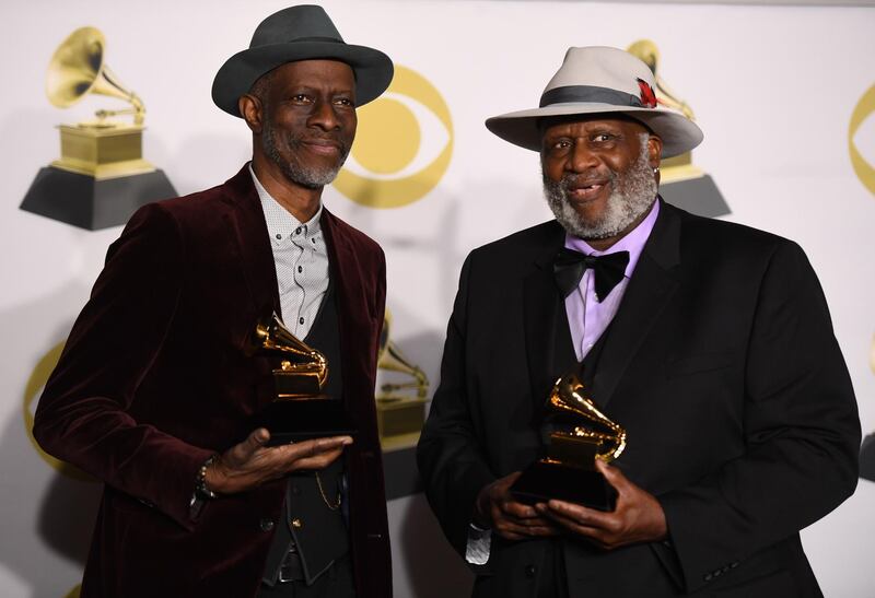 Keb' Mo' and Taj Mahal, winners of Best Contemporary Blues Album, pose in the press room during the 60th Annual Grammy Awards. AFP