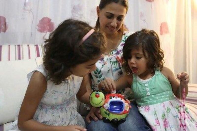 Danielle Ghanem, with her two daughters, is keen for her girls to start saving.