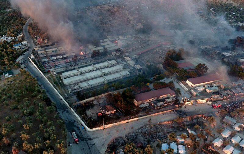 Fire burns container houses and tents in the Moria refugee camp on the northeastern Aegean island of Lesbos, Greece. AP Photo