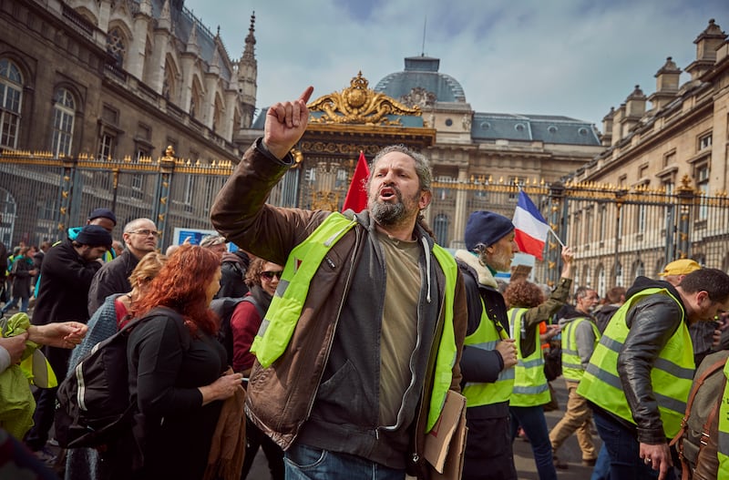 Yellow vest protesters demonstrate in front of the Palais de Justice in Paris in March 2019.