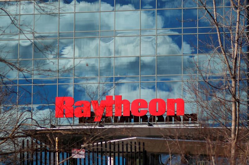 FILE PHOTO: A sign marks the Raytheon offices in Woburn, Massachusetts, U.S. January 25, 2017.   REUTERS/Brian Snyder/File Photo