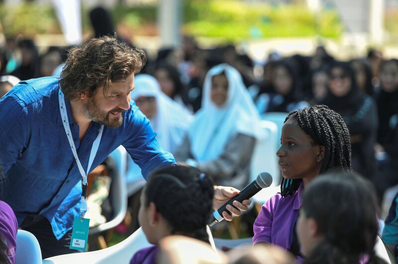 Abu Dhabi, United Arab Emirates - Young girl takes part in the educational programmes at the Hay Festival in Manarat, Al Saadiyat. Khushnum Bhandari for The National