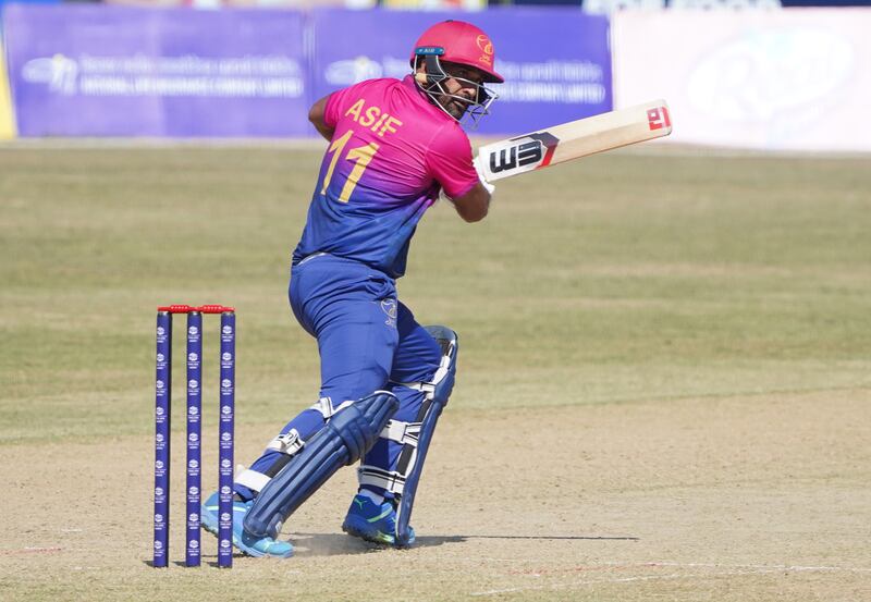 Asif Khan watches the ball after playing a shot.