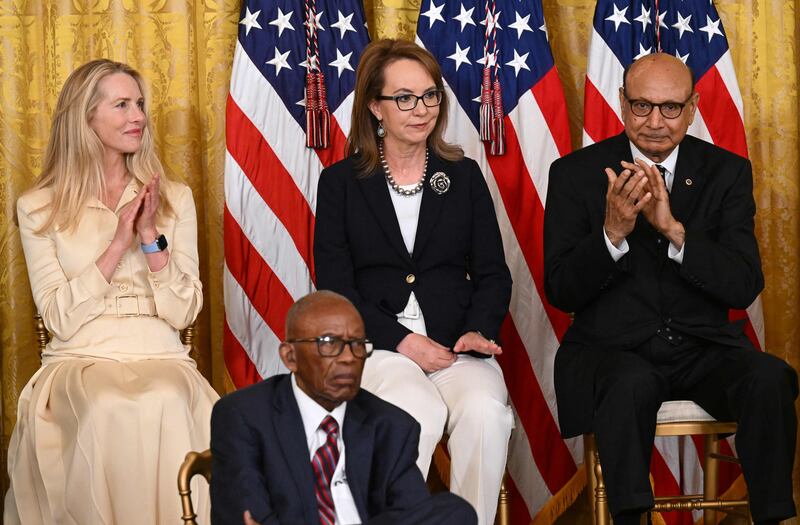 From left: US businesswoman Laurene Powell-Jobs, civil rights lawyer Fred Gray, former congresswoman Gabby Gifford, and Mr Khan at the medal ceremony. AFP