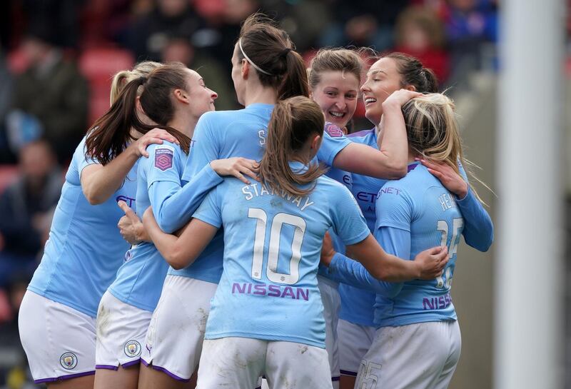 Manchester City's Ellen White (third right) celebrates scoring her side's second of the game with team-mates during the FA Cup fourth round match at Leigh Sports Village. PA Photo. Picture date: Saturday January 25, 2020. See PA story SOCCER Man Utd Women. Photo credit should read: Ian Hodgson/PA Wire. RESTRICTIONS: EDITORIAL USE ONLY No use with unauthorised audio, video, data, fixture lists, club/league logos or "live" services. Online in-match use limited to 120 images, no video emulation. No use in betting, games or single club/league/player publications.