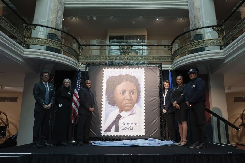 The unveiling of the a US Postal Service stamp featuring famous sculptor Edmonia Lewis at the Smithsonian American Art Museum on January 26 in Washington.  The Edmonia Lewis Forever stamp is the 45th stamp in the Black Heritage series and honours Lewis, who was the first African American and Native American sculptor to earn international recognition. Getty / AFP
