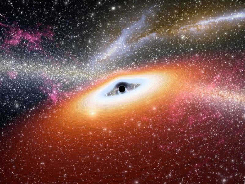 A Spitzer Space Telescope image from 2010 shows a young black hole. Now, scientists probing from the Antarctic say they have evidence of the effects of gravitational waves on microwave signals from the Big Bang. AFP / Nasa