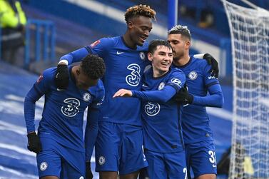 Chelsea's English striker Tammy Abraham (2nd L) celebrates with teammates after scoring his third goal, Chelsea's third during the English FA Cup fourth round football match between Chelsea and Luton Town at Stamford Bridge in London on January 24, 2021. - RESTRICTED TO EDITORIAL USE. No use with unauthorized audio, video, data, fixture lists, club/league logos or 'live' services. Online in-match use limited to 120 images. An additional 40 images may be used in extra time. No video emulation. Social media in-match use limited to 120 images. An additional 40 images may be used in extra time. No use in betting publications, games or single club/league/player publications. / AFP / DANIEL LEAL-OLIVAS / RESTRICTED TO EDITORIAL USE. No use with unauthorized audio, video, data, fixture lists, club/league logos or 'live' services. Online in-match use limited to 120 images. An additional 40 images may be used in extra time. No video emulation. Social media in-match use limited to 120 images. An additional 40 images may be used in extra time. No use in betting publications, games or single club/league/player publications.